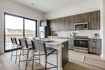Step into a kitchen where style meets functionality, featuring a seamless blend of elegance and efficiency.