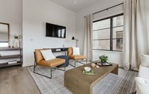 Experience modern elegance in this beautifully designed living room space.