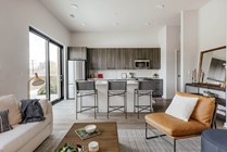 Experience contemporary elegance in this spacious open living area, perfect for relaxation and entertaining.