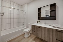 Experience luxury in this elegantly designed modern bathroom.