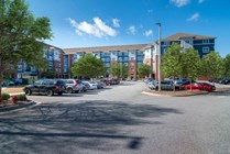 The-Flats-at-Carrs-Hill-Apartments-Near-UGA-Building-Exterior-Parking-Lot
