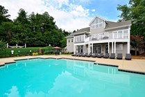 River-Club-Apartments-Off-Campus-Apartments-Near-The-University-of-Georgia-Athens-Georgia-Main-Swimming-Pool-Clubhouse-Exterior